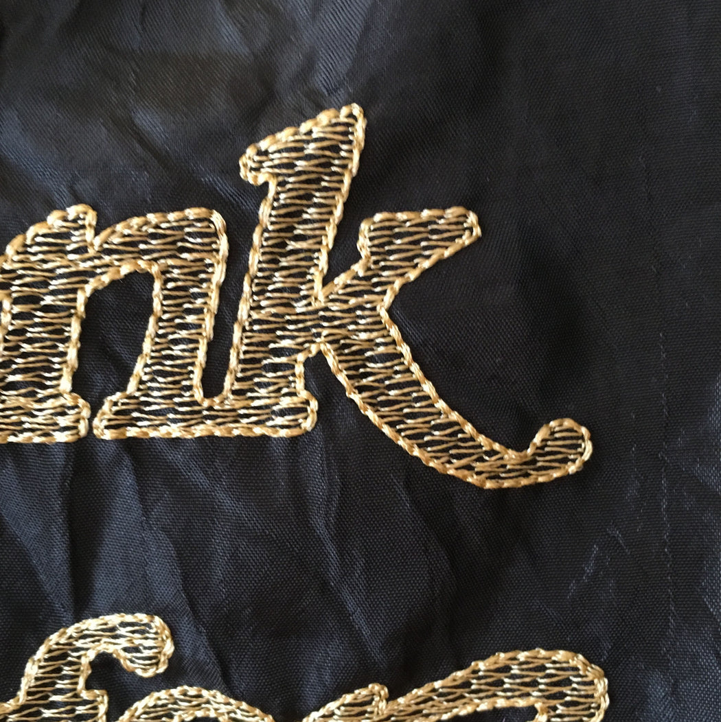 SHOPPING / Gold Thread on Black Fabric — OPEN EDITIONS